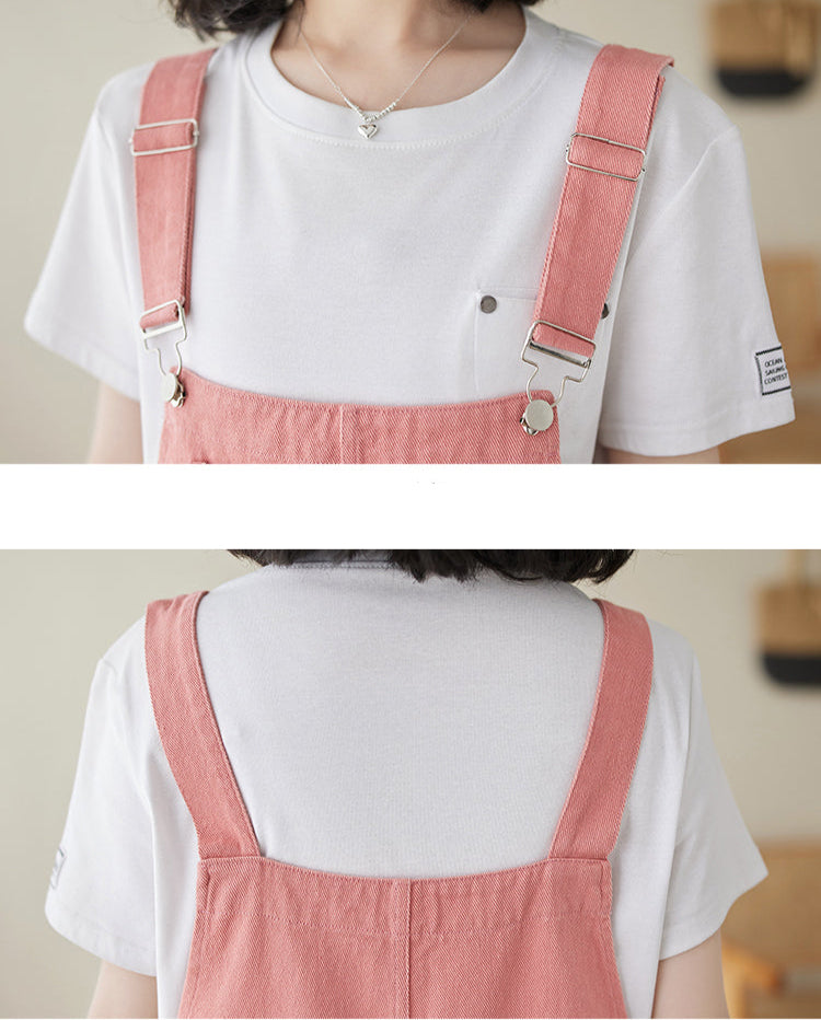 Person wearing a white shirt with pink suspenders, showing front and back views.