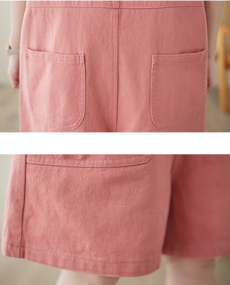 Close-up of pink shorts showing back and hem details.