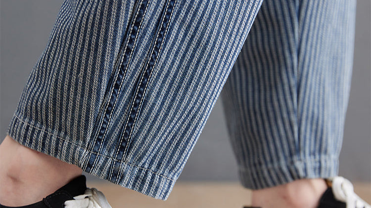 Close-up of blue striped pants with a blurred background