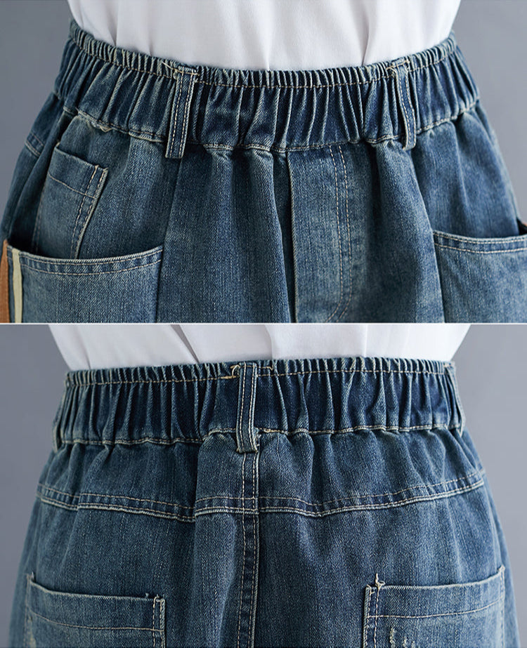 Denim skirt with elastic waistband displayed on a person against a neutral background
