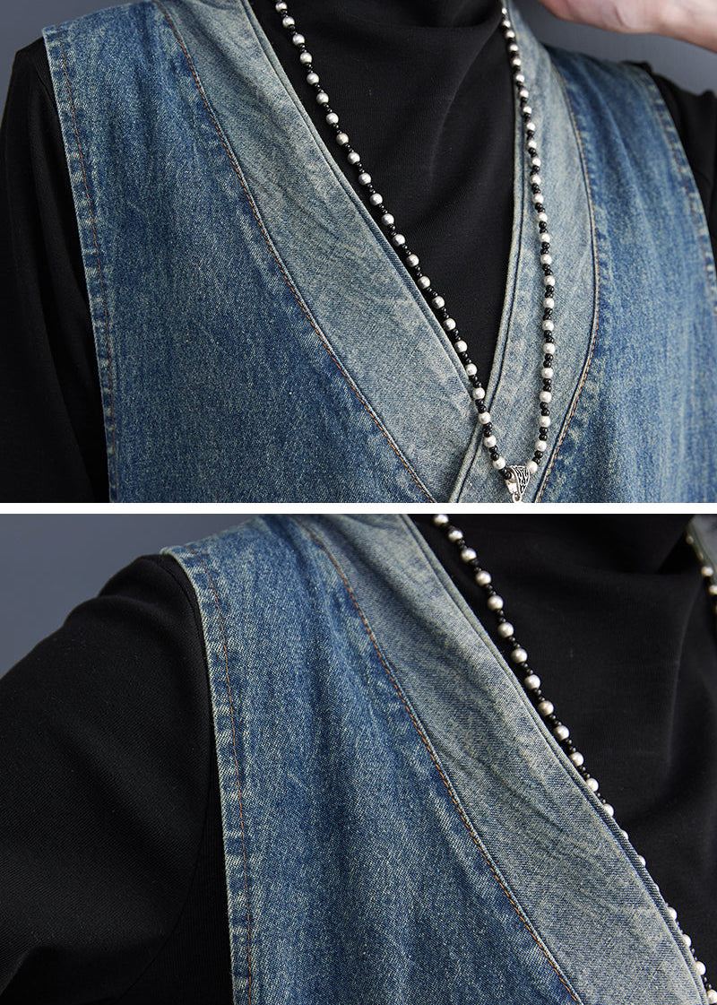 Denim vest with pearl details on a black background