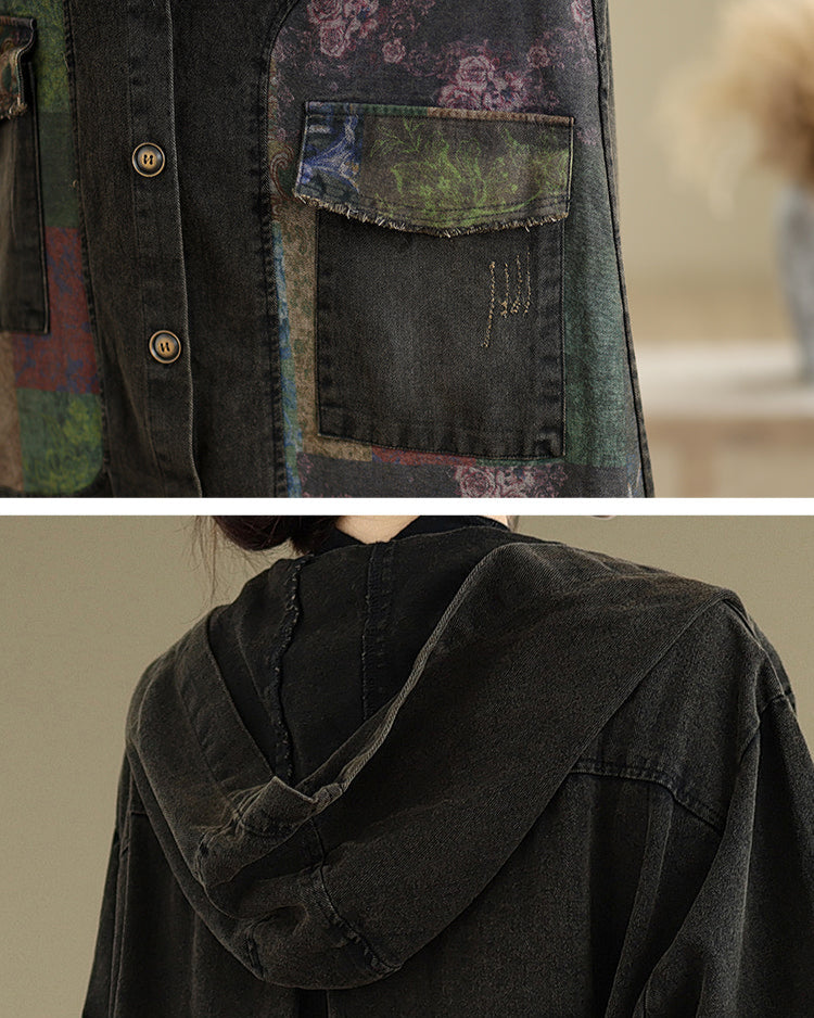 Dark denim jacket with floral patch and hood detail.